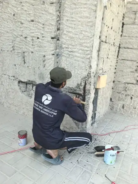 Worker Performing Civil and Masonry Work on Building Construction Site